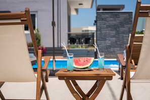 Seasonal outdoor pool, open 9:00 AM to 9:00 PM, pool umbrellas - Sun Ray Luxury Apartments (Chania)