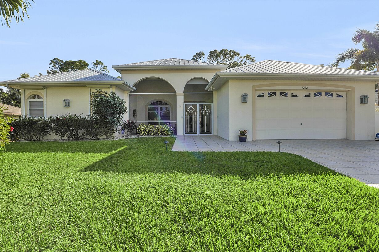 Villa Palmetto - Engel & Voelkers Cape Coral - Southern Exposure on Golf Cours