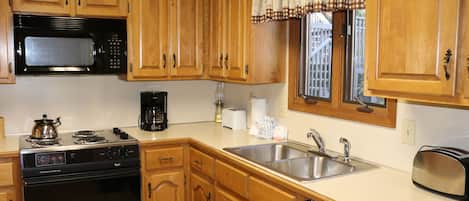 Fridge, microwave, coffee/tea maker, toaster
