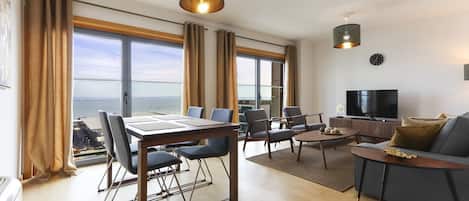 Apartment, 2 Bedrooms, 2 Bathrooms, River View | Living area | Flat-screen TV