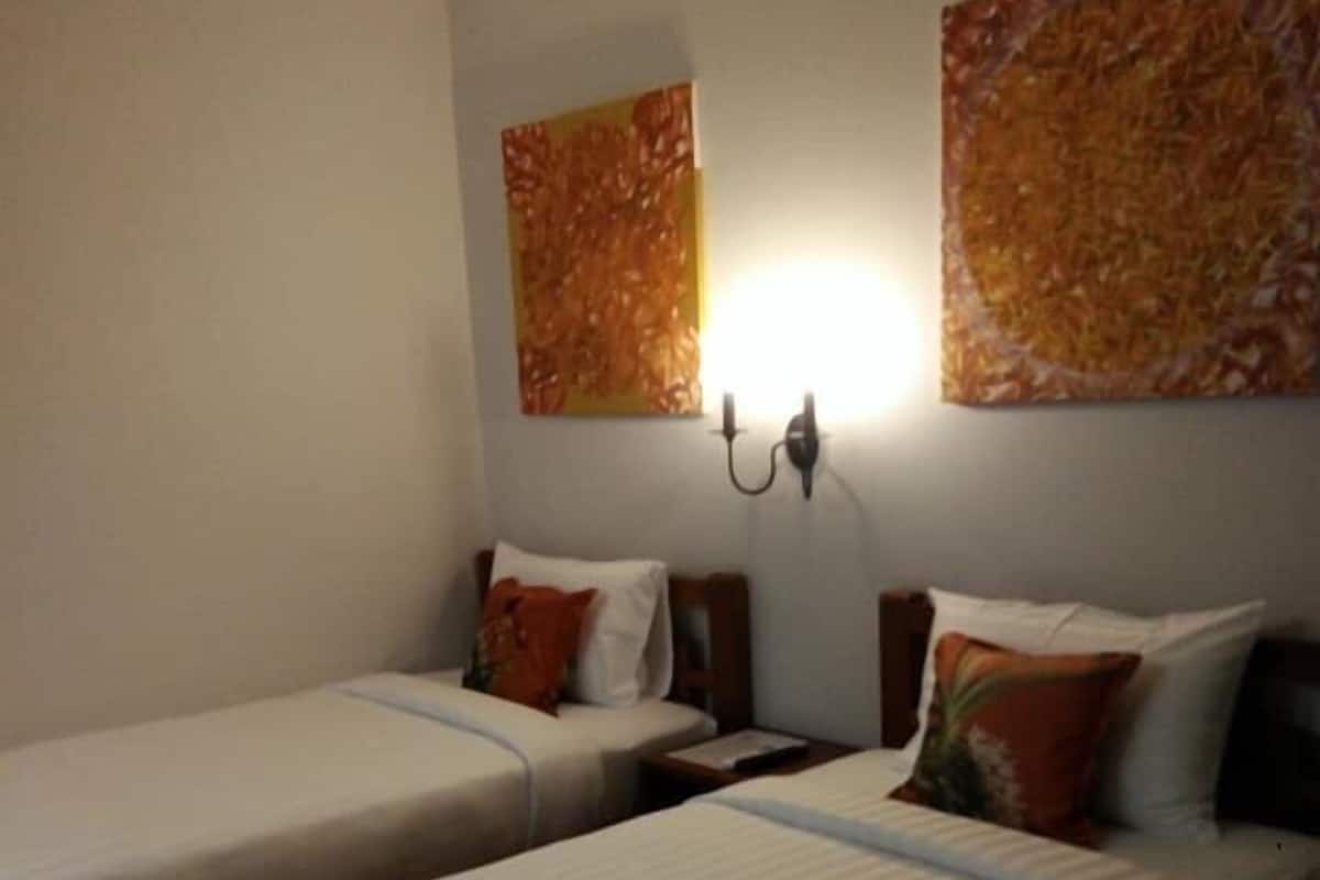 Twin Room | Premium bedding, desk, soundproofing, rollaway beds