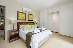 Luxury Villa, 4 Bedrooms | 4 bedrooms, in-room safe, iron/ironing board, bed sheets - San Lameer Villa Rentals 403 (Southbroom)
