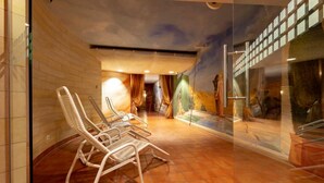 A room with a tiled floor, a glass wall with a view, and a ceiling mural. - Hotel Gasthof Krone (Niederstetten)