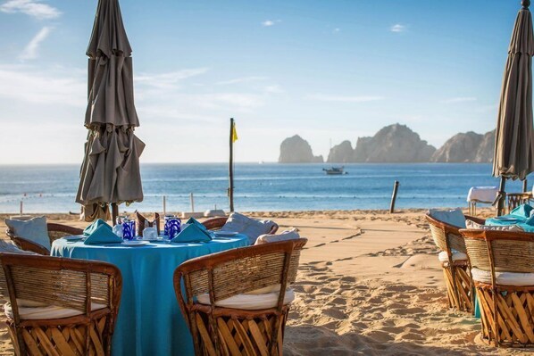 On the beach, sun-loungers, beach towels
