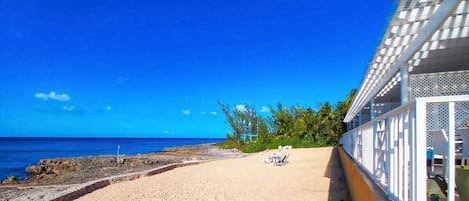 On the beach, sun-loungers, beach towels