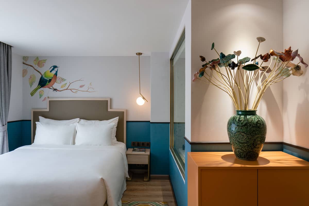 Family Connecting Suite | Minibar, in-room safe, desk, blackout curtains