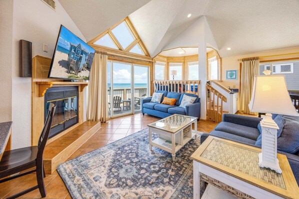 Flat-screen TV, DVD player, books