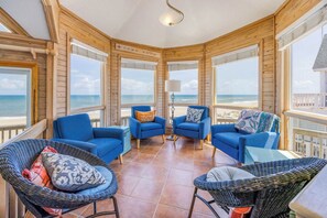 Flat-screen TV, DVD player, books