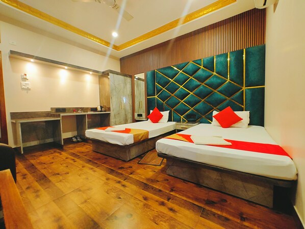 Deluxe Twin Room | Pillowtop beds, blackout drapes, iron/ironing board, free WiFi