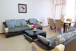 Studio Apartment  | Área de estar | TV de tela plana