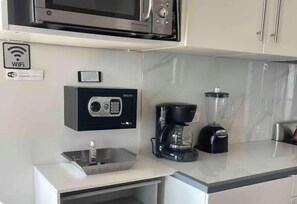 Fridge, microwave, coffee/tea maker, toaster