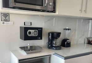 Fridge, microwave, coffee/tea maker, toaster