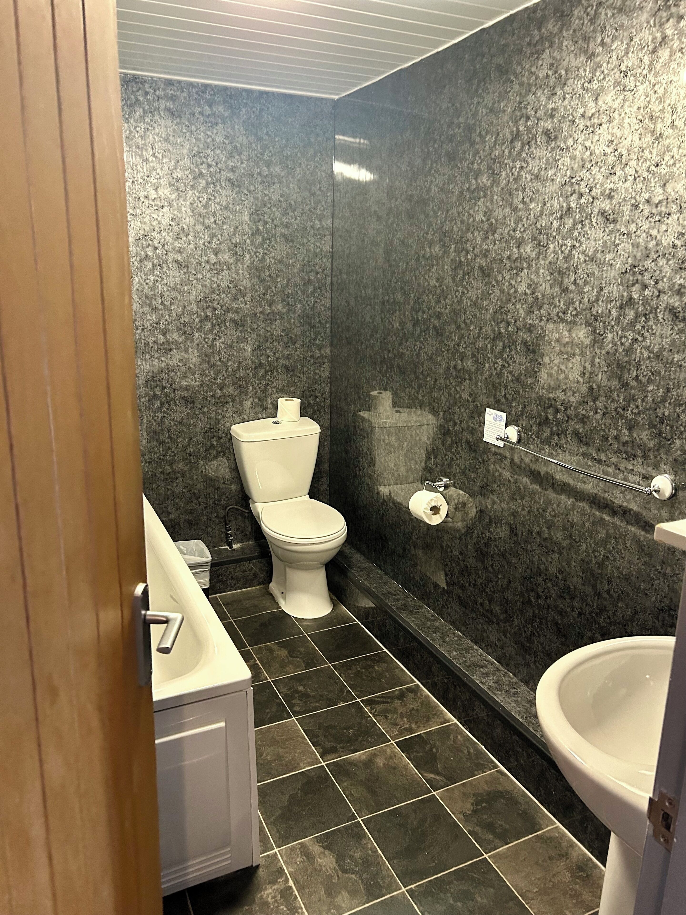 deep-soaking bathtub, free toiletries, hair dryer, towels