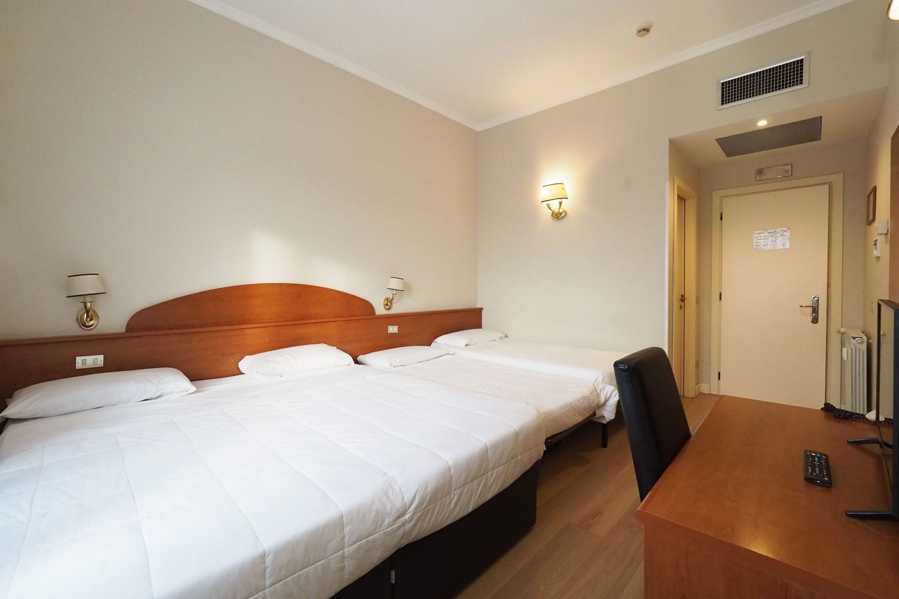 Desk, blackout curtains, free WiFi, bed sheets