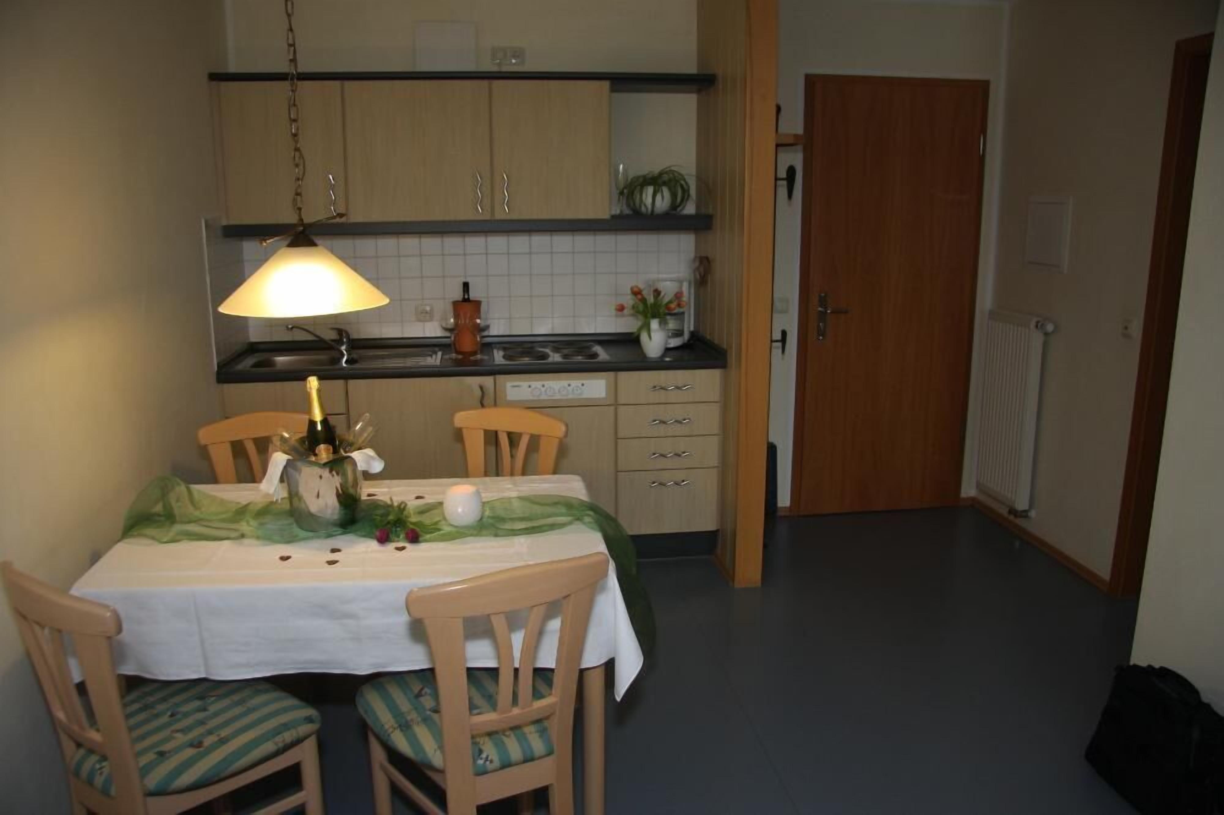 Apartment, Balcony | Private kitchen | Fridge, microwave, stovetop, coffee/tea maker