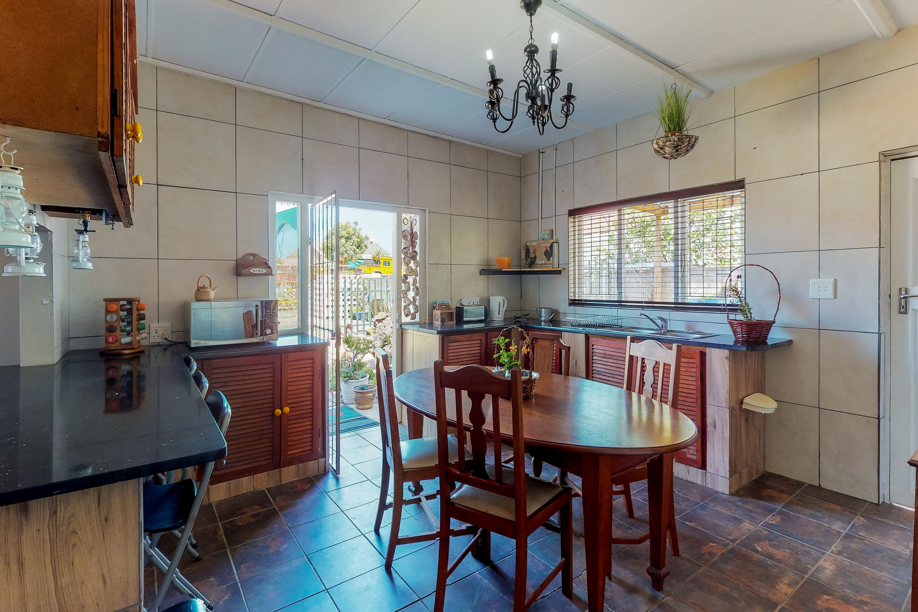 Apartment, 2 Bedrooms | Private kitchen | Full-sized fridge, microwave, electric kettle, cookware/dishes/utensils