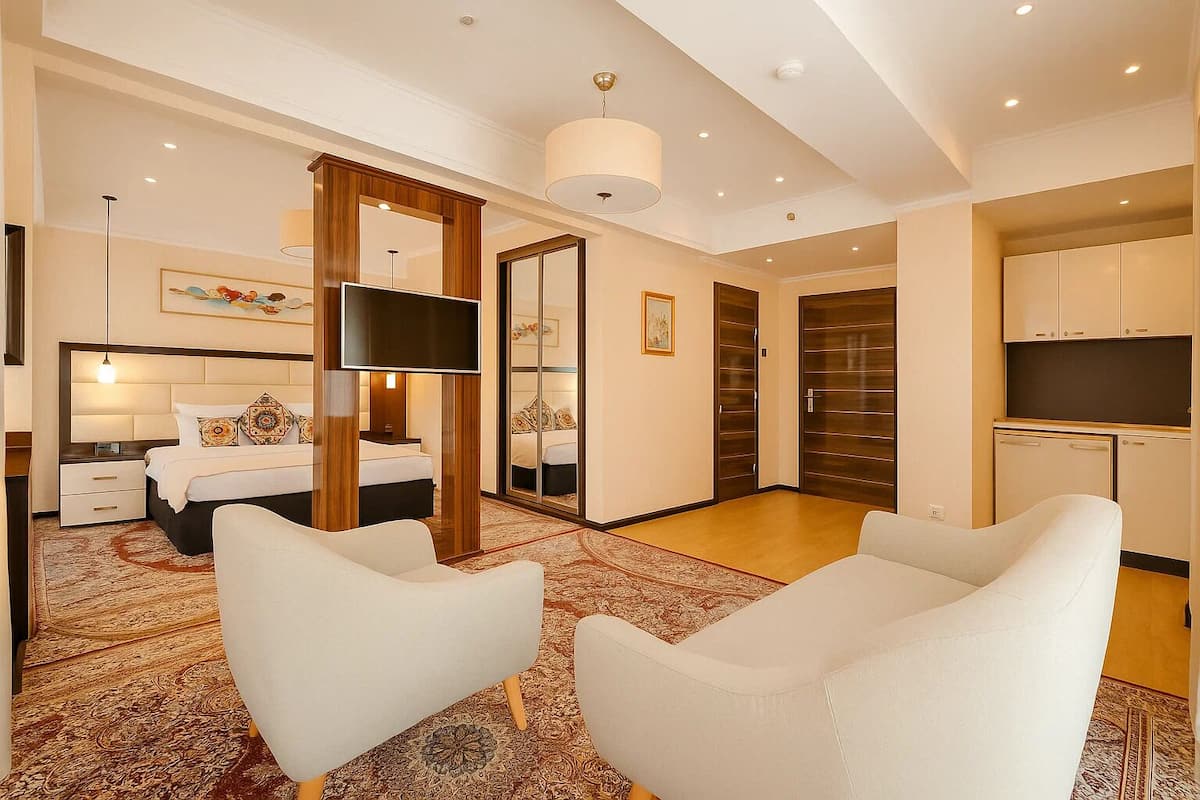 suite | in-room safe, desk, blackout curtains, soundproofing