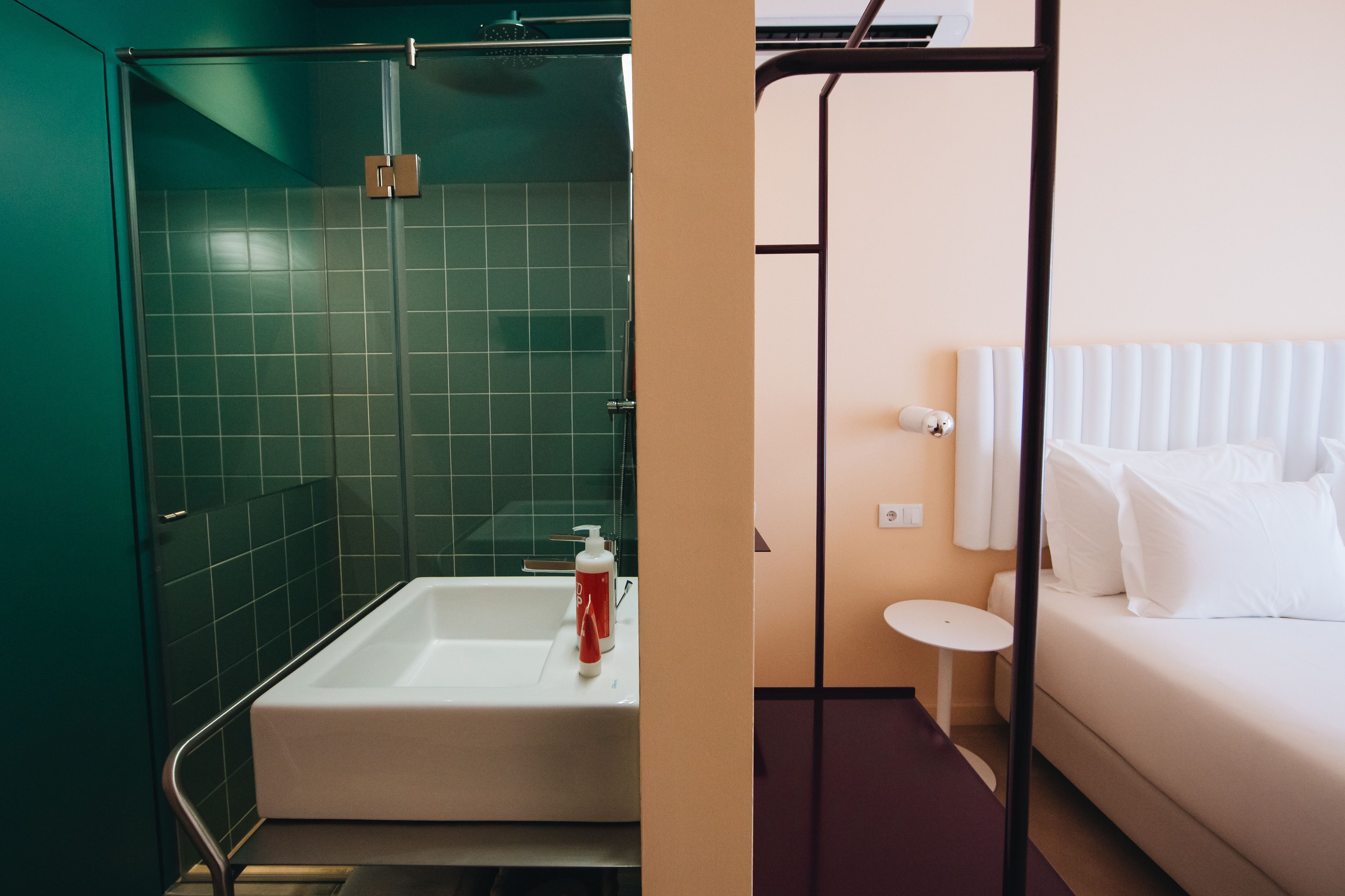 A bathroom with a bathtub, a shower, and a toilet.