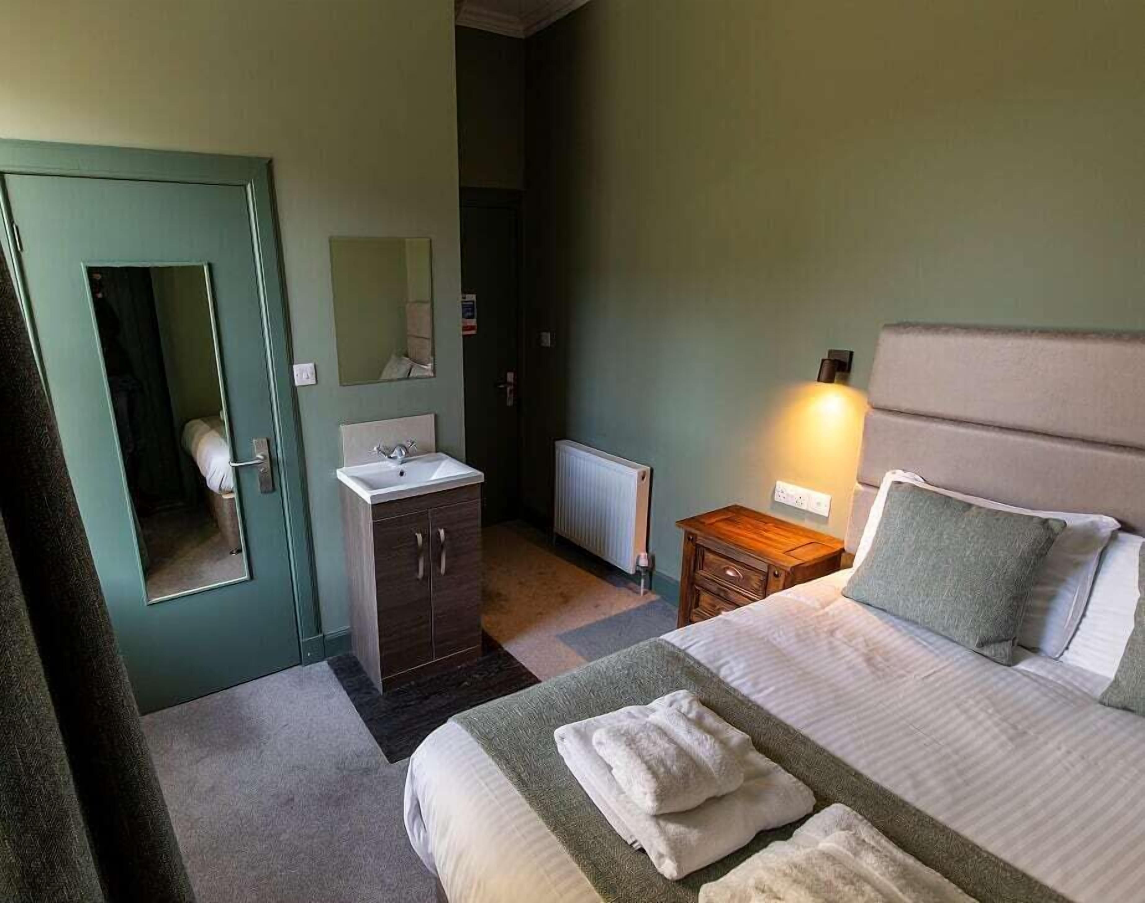 Premium bedding, blackout drapes, iron/ironing board, free WiFi