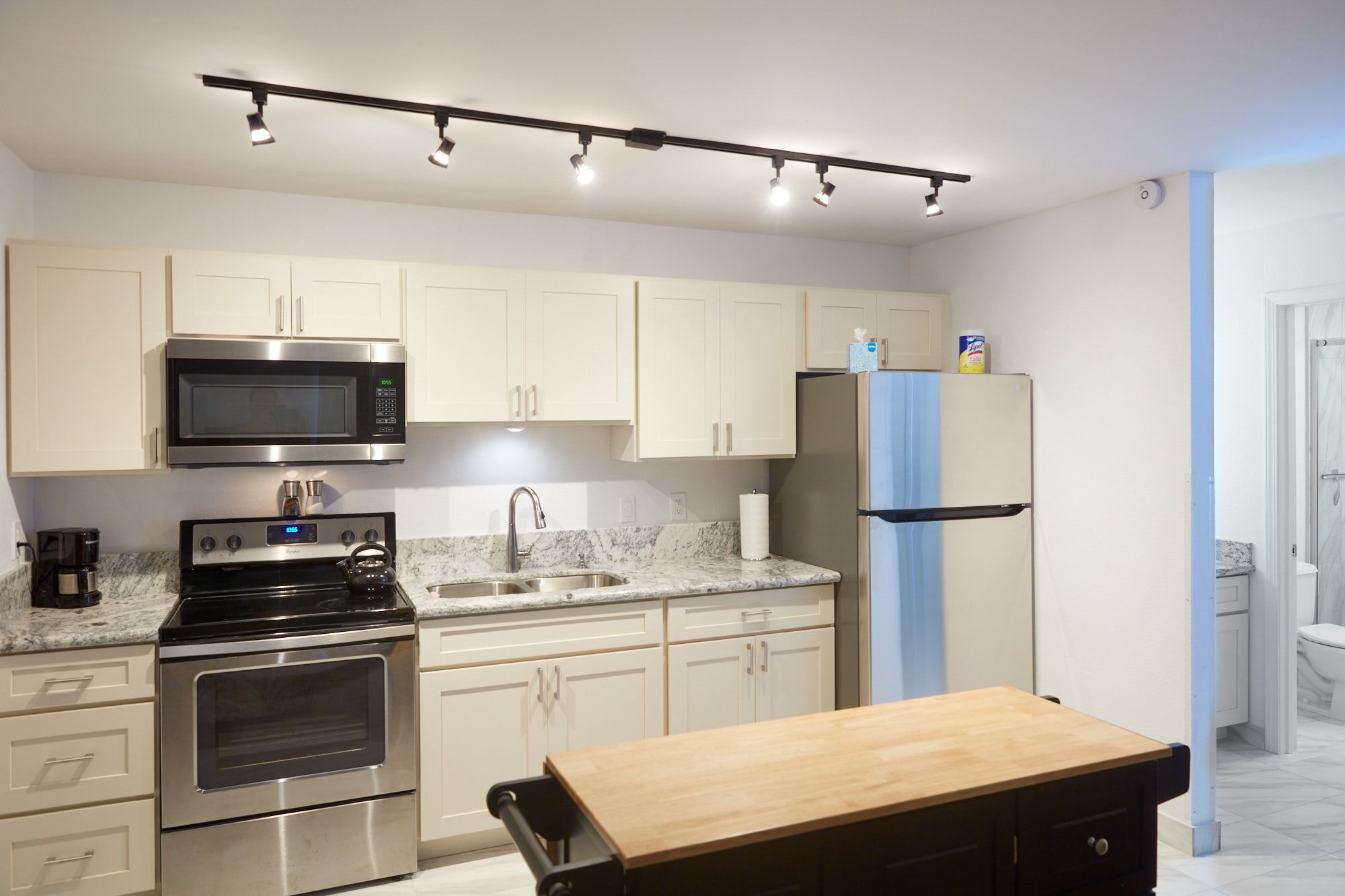 New porcelain, granite, cabinets and appliances and details.... 