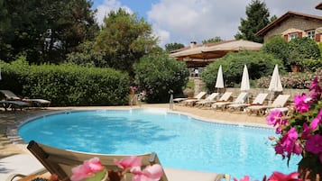 Seasonal outdoor pool, pool umbrellas, sun loungers