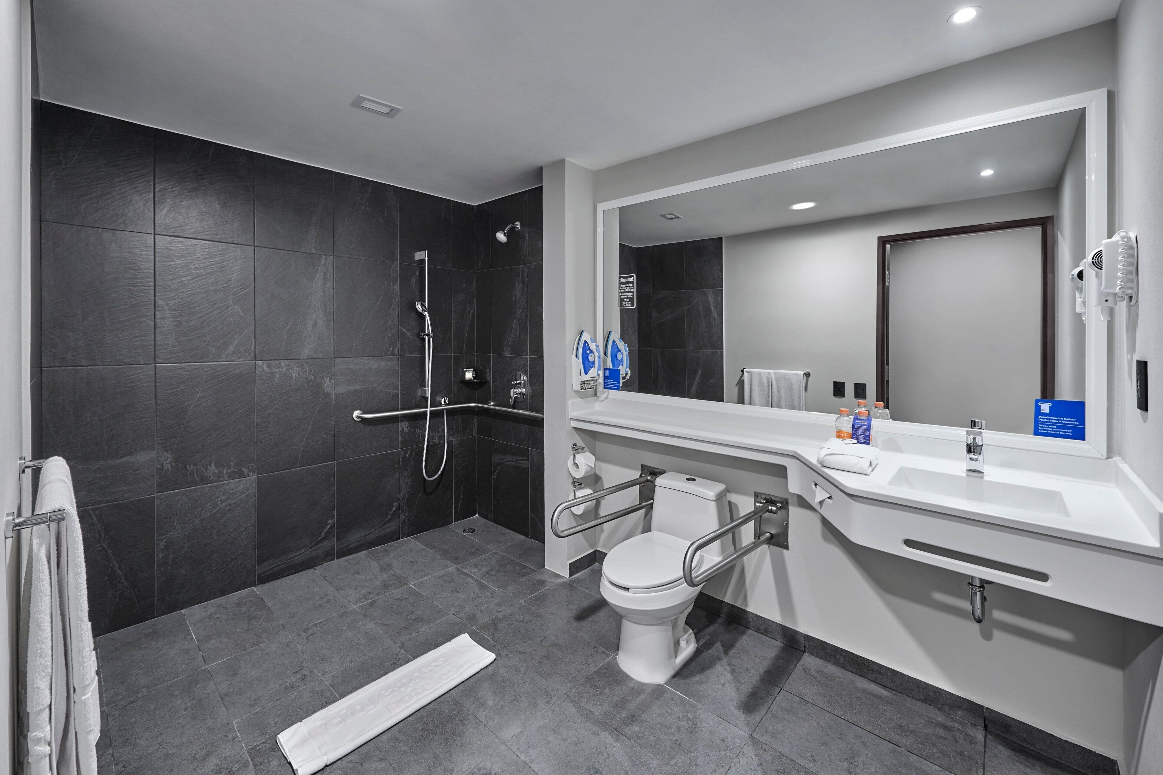 room, 1 king bed | bathroom | shower, free toiletries, hair dryer, towels