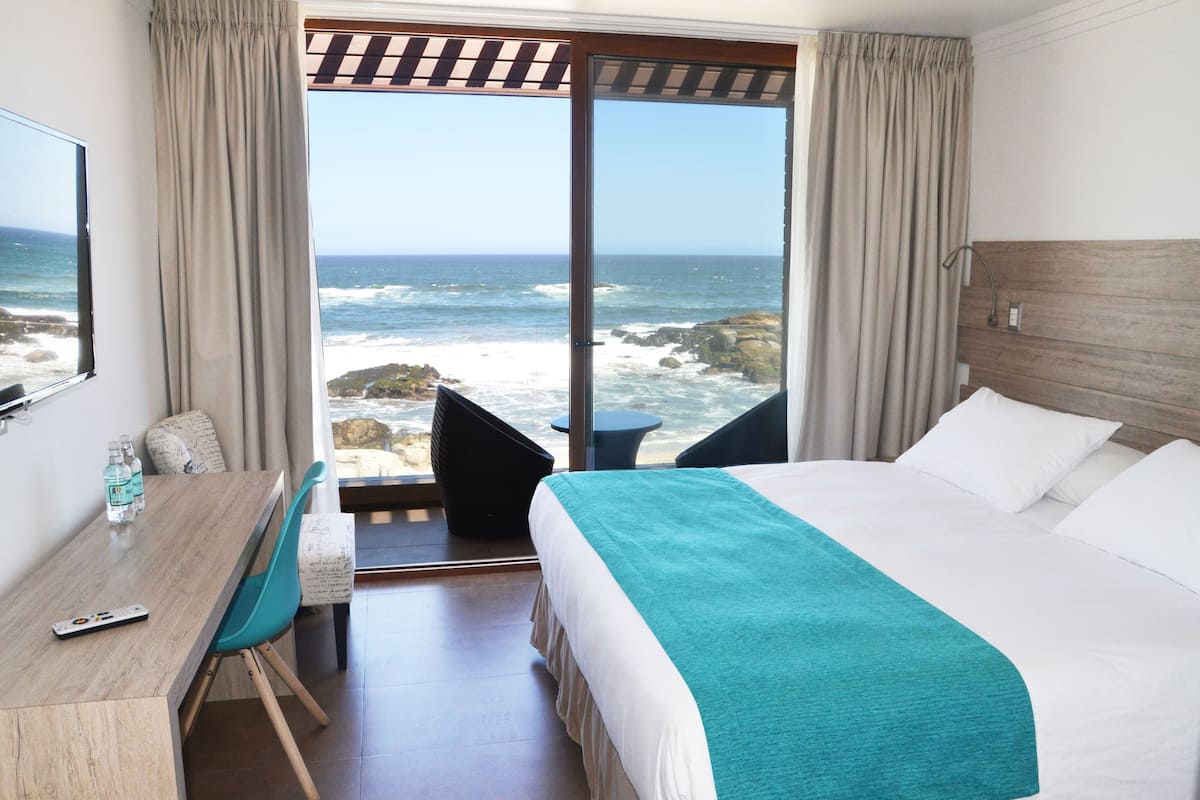 superior double room, 1 king bed, non smoking, beach view | 1 bedroom, in-room safe, blackout curtains, soundproofing