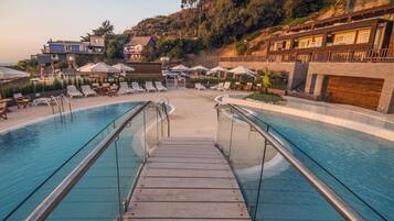 Indoor pool, outdoor pool, open 9:00 AM to 9:00 PM, sun loungers