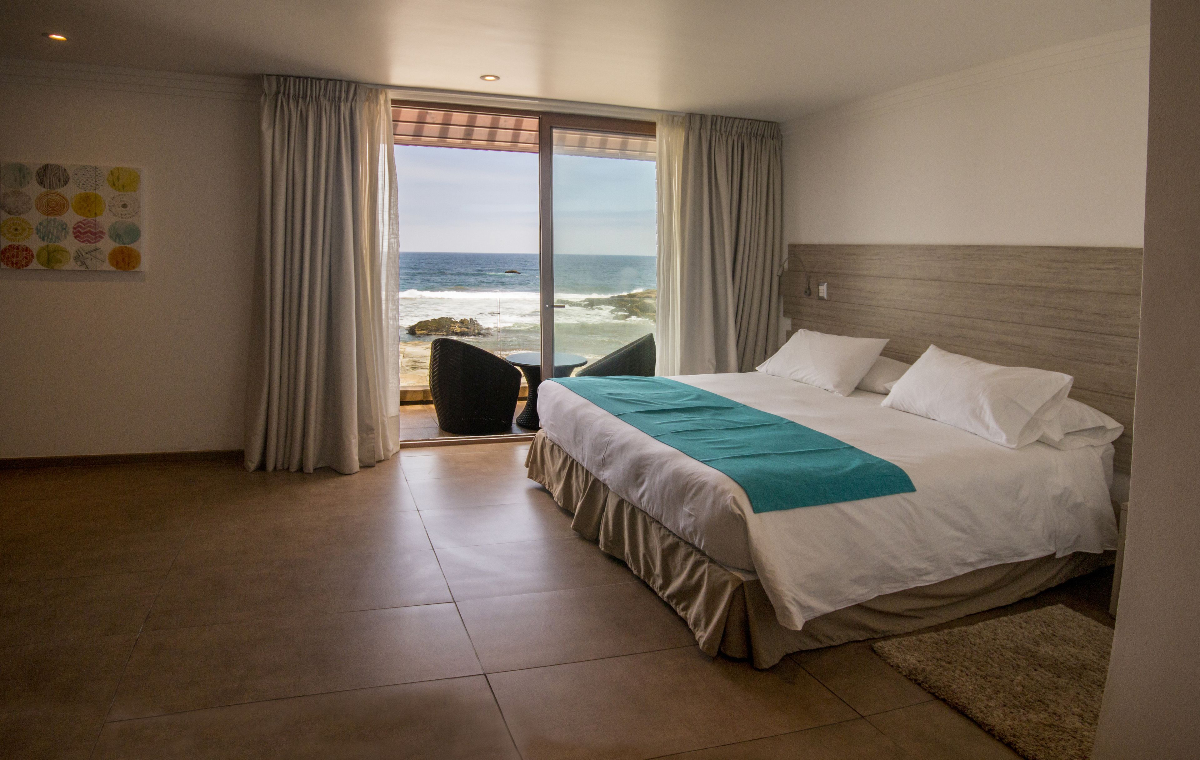 superior double room, 1 king bed, non smoking, beach view | 1 bedroom, in-room safe, blackout curtains, soundproofing