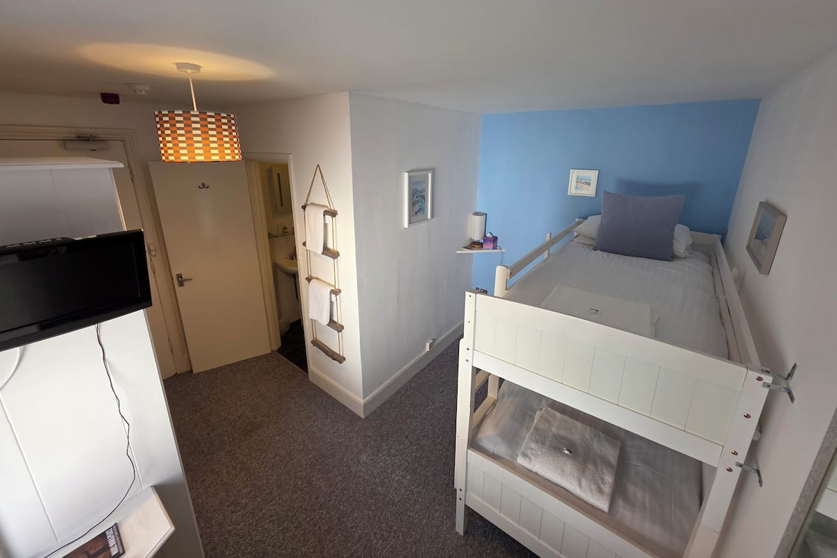 Individually decorated, individually furnished, desk, laptop workspace