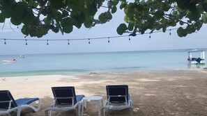 Private beach, white sand, beach bar - Secret Cabins at Firefly Beach (Negril)
