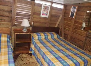 Memory foam beds, free WiFi, bed sheets - Secret Cabins at Firefly Beach (Negril)