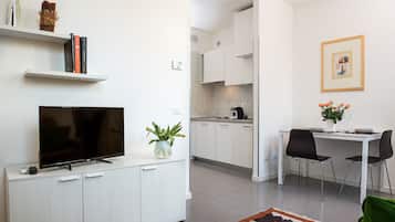 Superior Apartment, 1 King Bed | Living area | Plasma TV