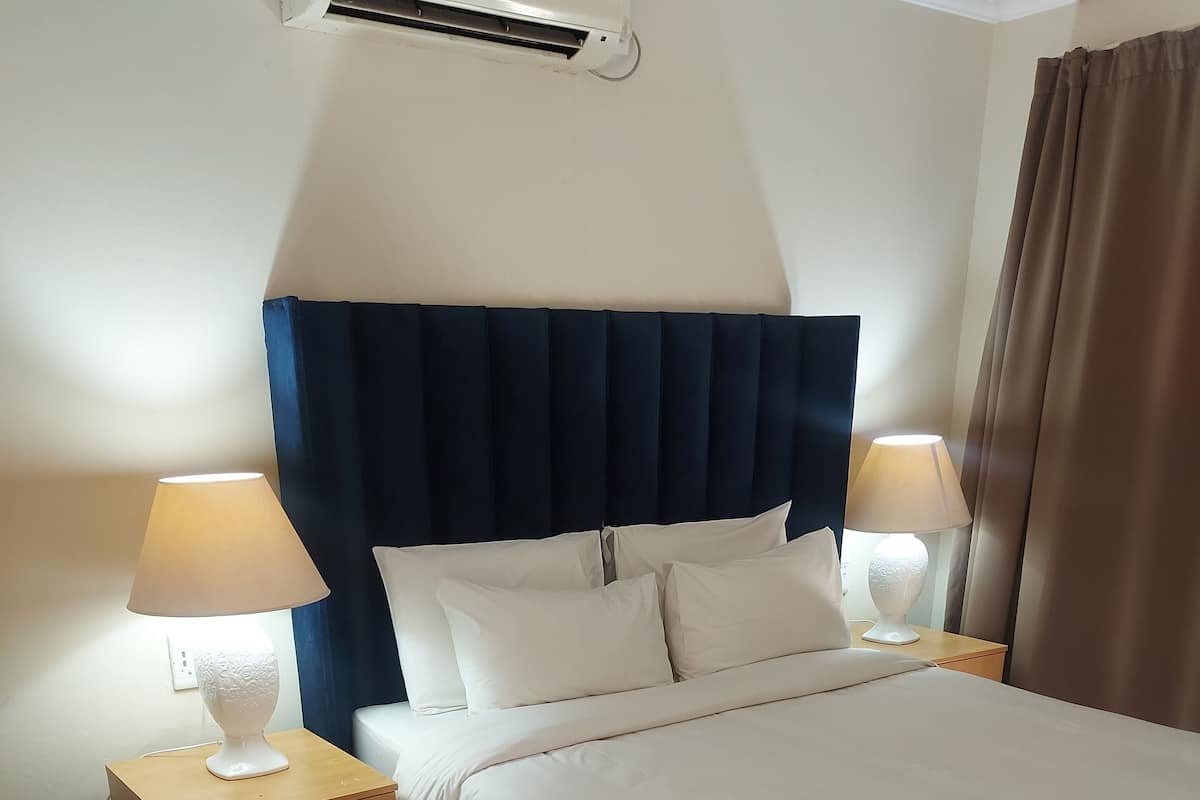 Economy Double Room, 1 Double Bed, Non Smoking, Garden View (#11) | Desk, iron/ironing board (on request), WiFi (free), bed sheets