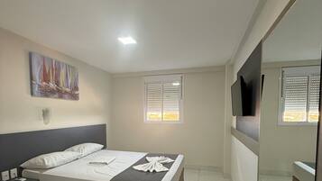 Standard Double or Twin Room | Minibar, individually furnished, desk, blackout drapes