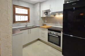 Fridge, microwave, coffee/tea maker, toaster