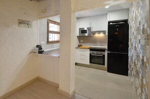 Fridge, microwave, coffee/tea maker, toaster