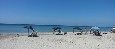 Beach nearby, sun loungers
