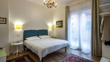 2 chambres, coffres-forts dans les chambres, fer et planche Ă repasser