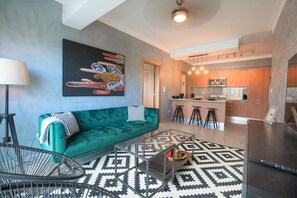 Smart TV, stereo - Chic City Center Apartment with Rooftop Pool + Gym (Julieta Morales)