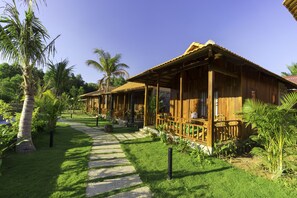 Deluxe Chalet, Pool View | Premium bedding, minibar, desk, laptop workspace - Island Lodge Phu Quoc (Phu Quoc)