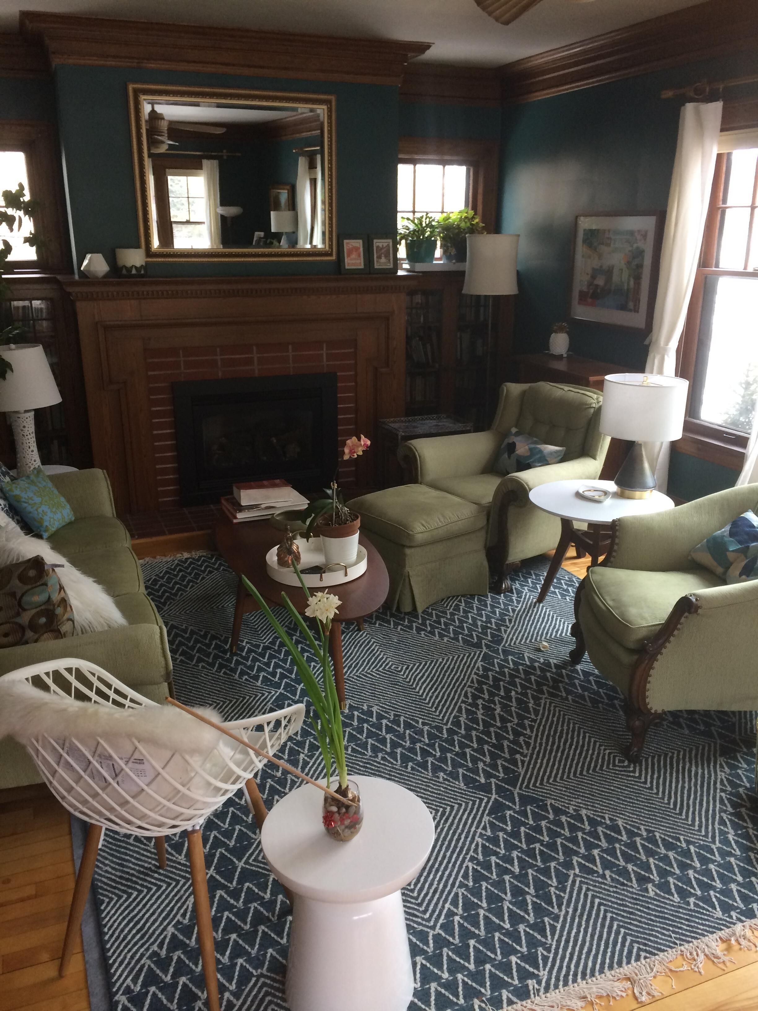 Living room, with fireplace and lots of windows