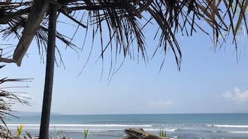 On the beach, sun-loungers, beach towels