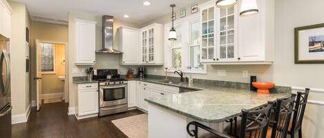 Fridge, coffee/tea maker, cookware/dishes/utensils