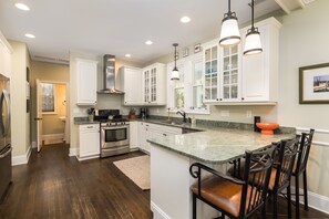 Fridge, coffee/tea maker, cookware/dishes/utensils