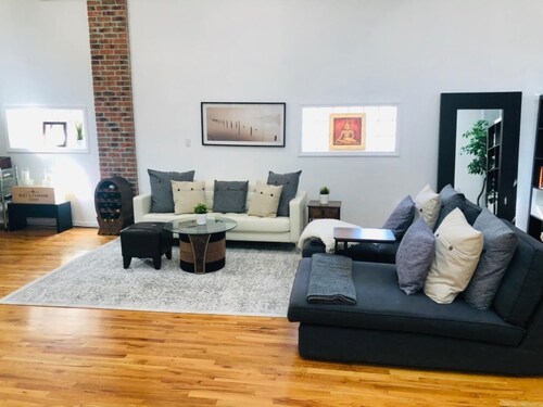UPDATED Amazing Bi -Level Condo  minutes from water views of New York City.