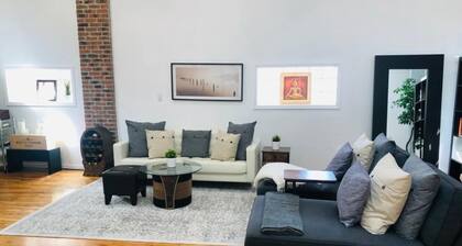 UPDATED Amazing Bi -Level Condo minutes from water views of New York City.
