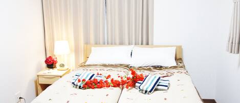 Casa de ciudad Deluxe, varias camas | 1 habitación, ropa de cama de alta calidad y decoración personalizada