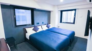 Desk, laptop workspace, free WiFi, bed sheets