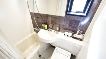 Combined shower/tub, deep soaking tub, free toiletries, hair dryer